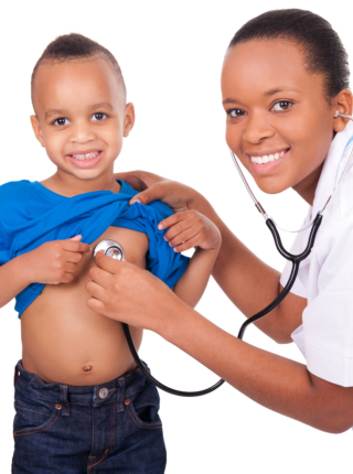 Doctor checking a young boy